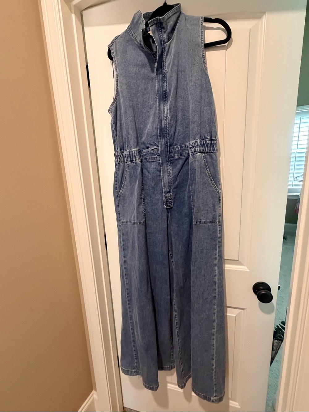 Sleeveless Light Blue Denim Jumpsuit with High Collar